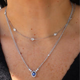 18K White Gold Halo Necklace with 0.90ct Oval Sapphire & 0.31ct Diamond Accents